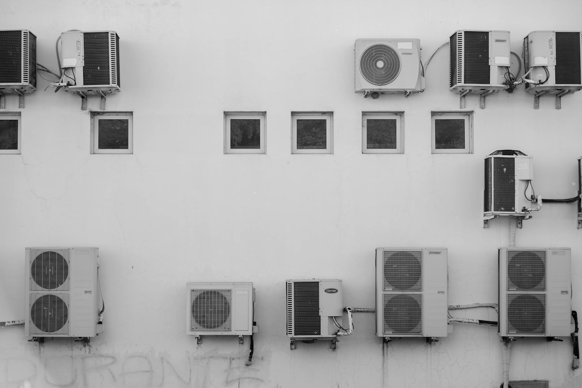 wall mounted air conditioners on building facade