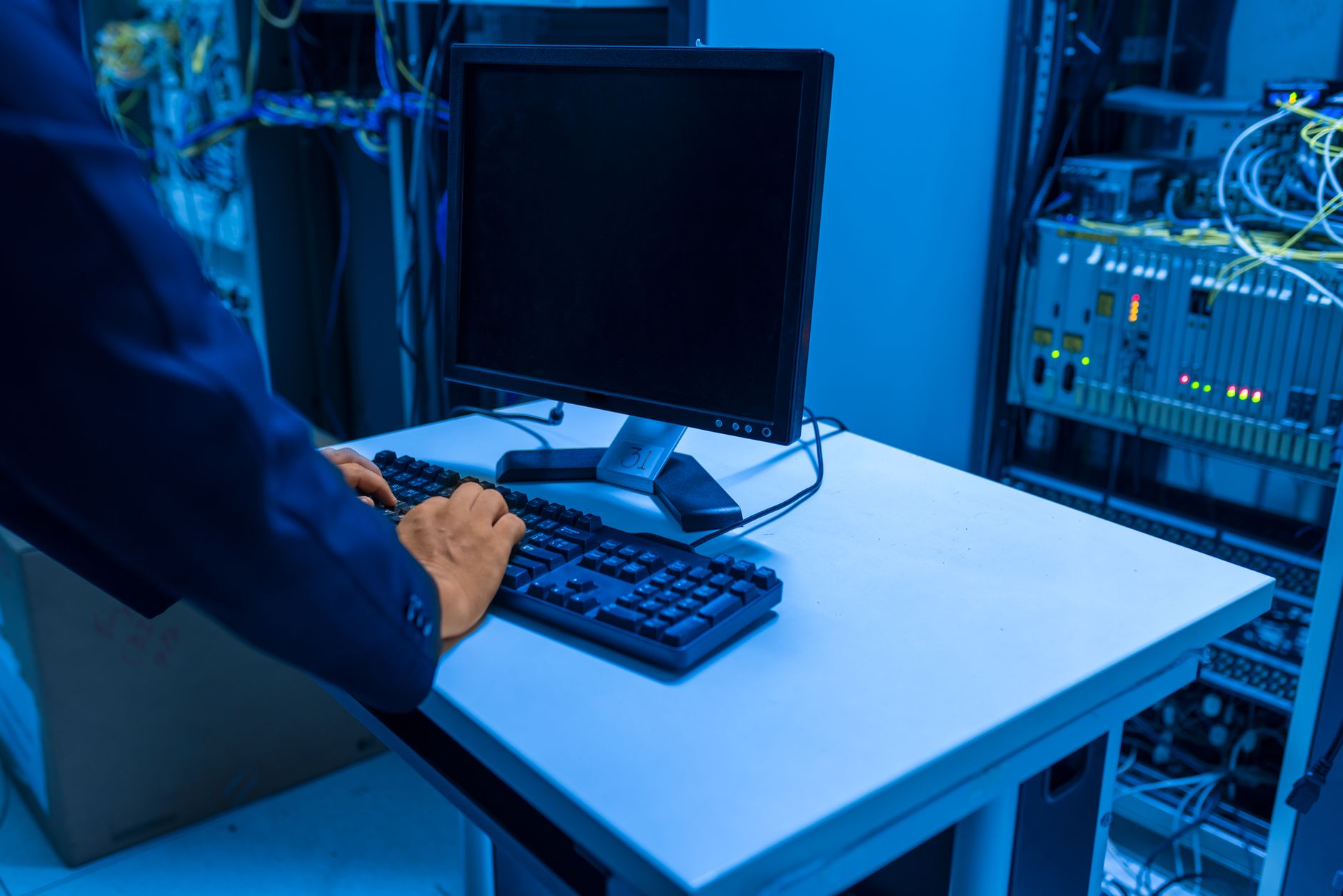 it technician working in data center server room